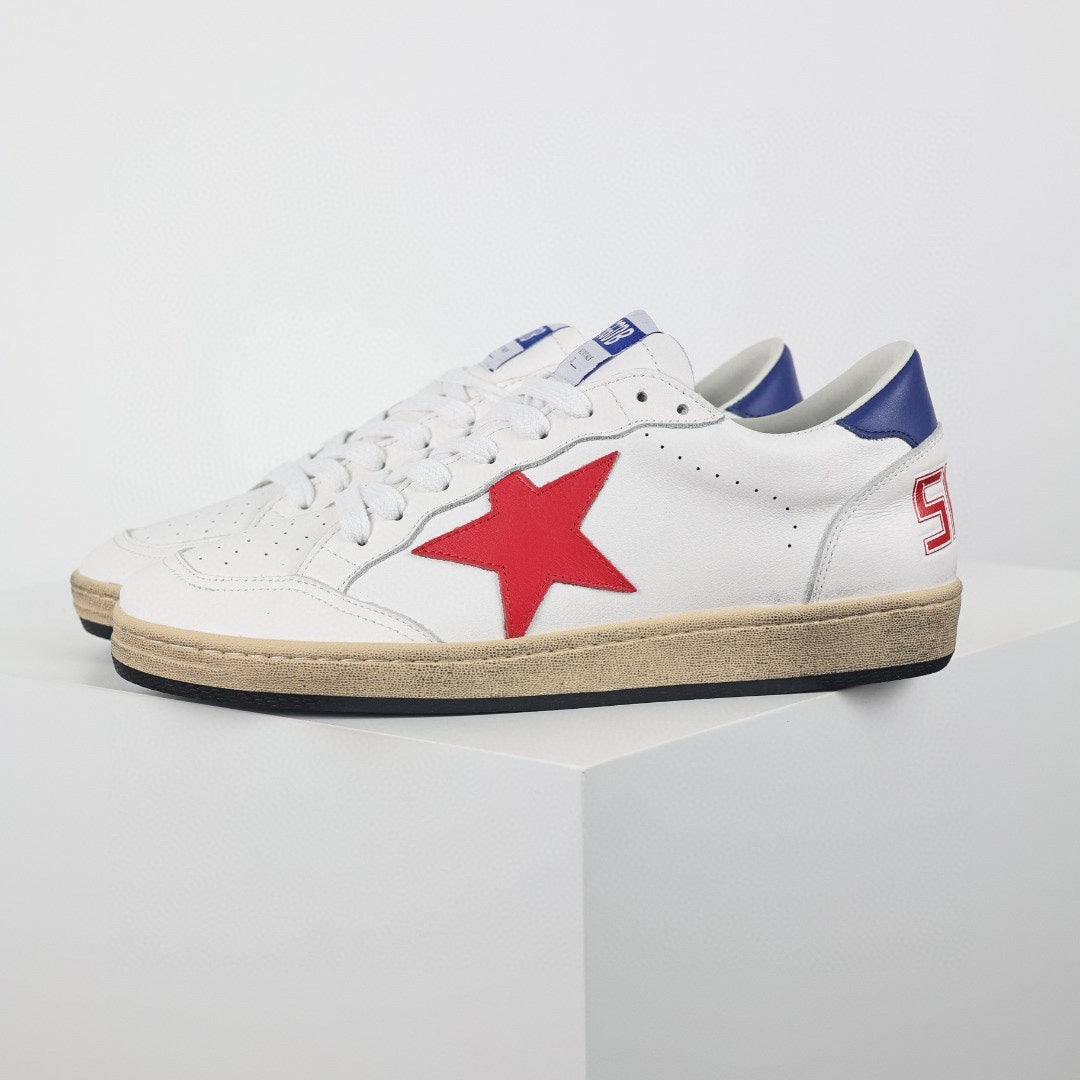 Star patch leather low-top sneakers, red star with blue heel