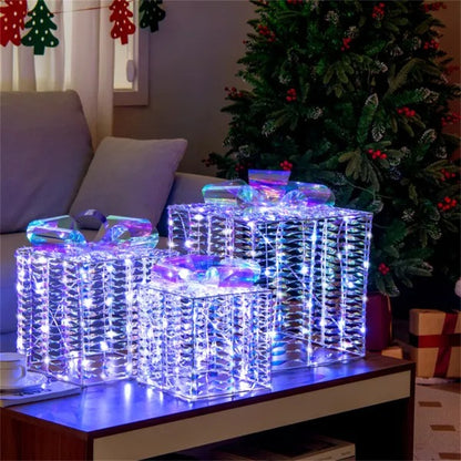 Set of three iridescent lighted Christmas gift box decorations