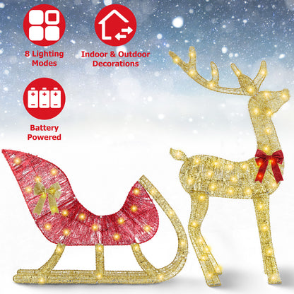 Lighted gold reindeer and red sleigh Christmas decoration