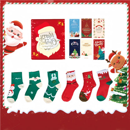 Six pairs of Christmas socks in a gift box with greeting cards