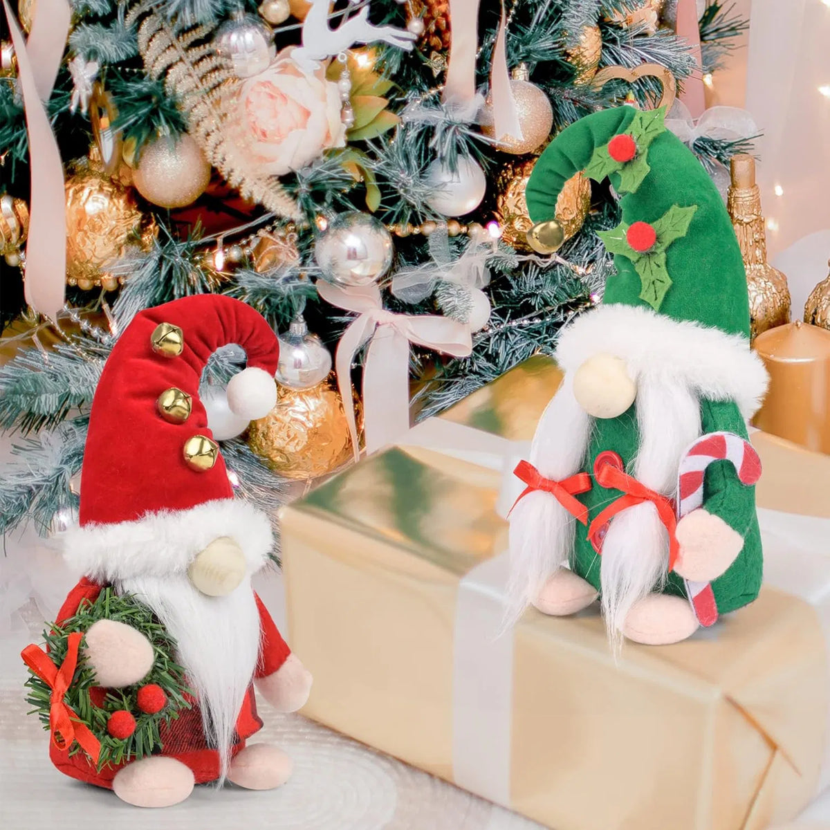 Pair of plush Christmas gnomes in red and green hats
