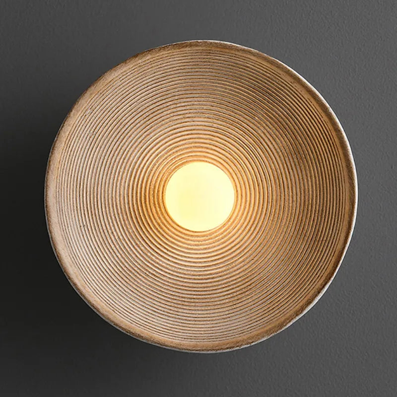 Rustic Round Wall Sconce with Wood-Grain Finish