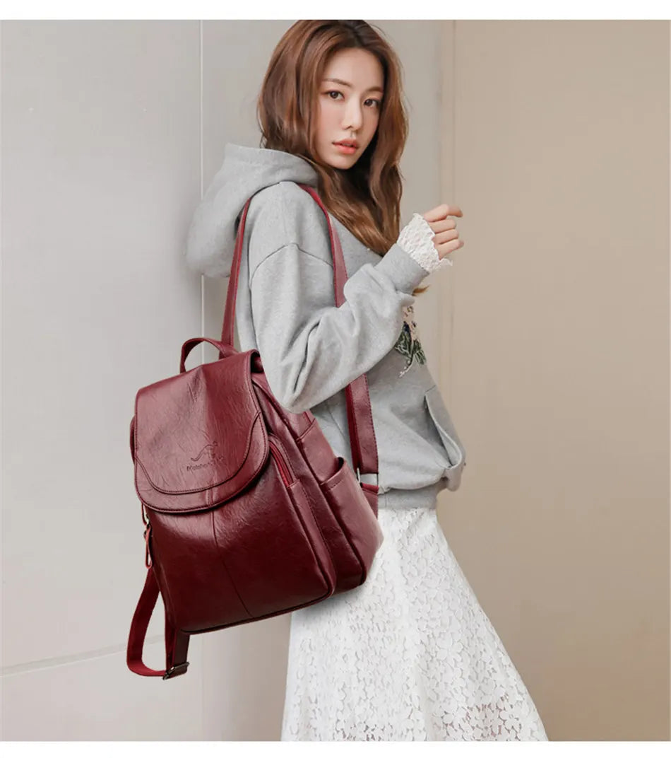 Leather backpack styled with a casual outfit