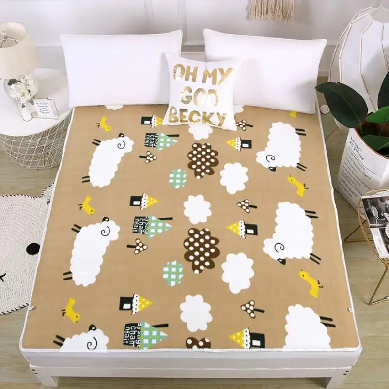 Sheep pattern electric blanket on a bed