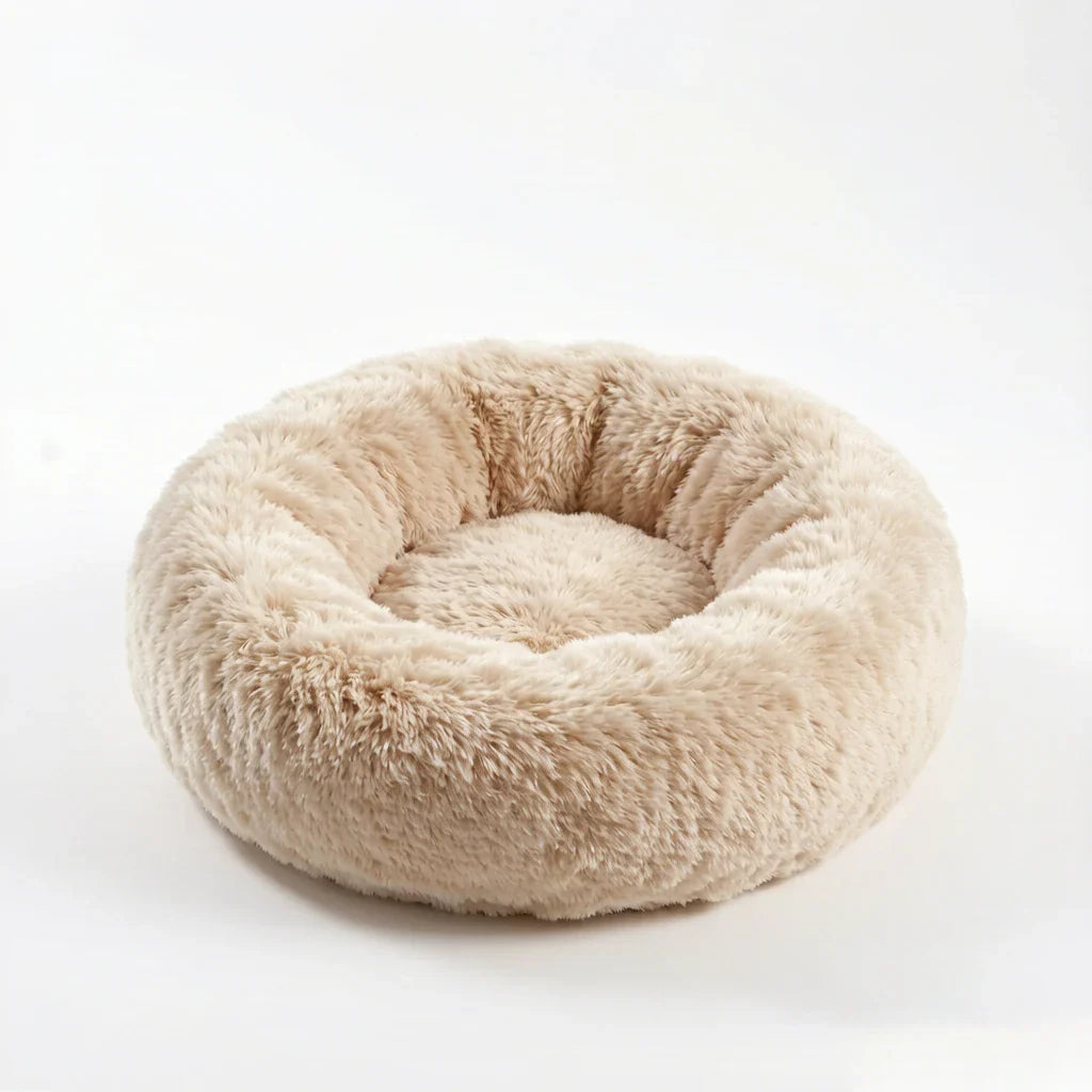 Beige plush donut pet bed
