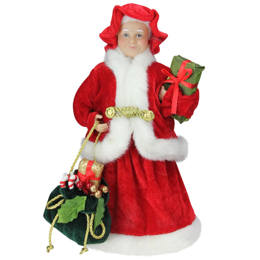 12 inch Mrs. Claus Christmas figure holding a gift and bag