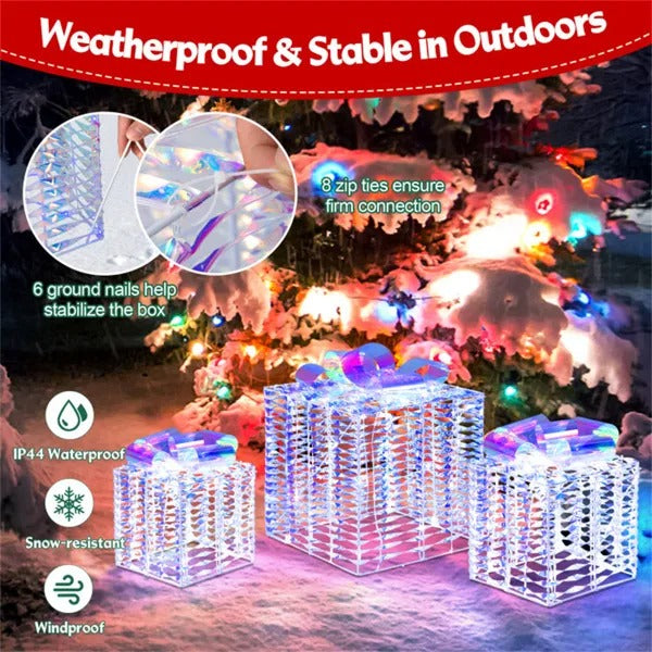 Set of three iridescent lighted Christmas gift box decorations