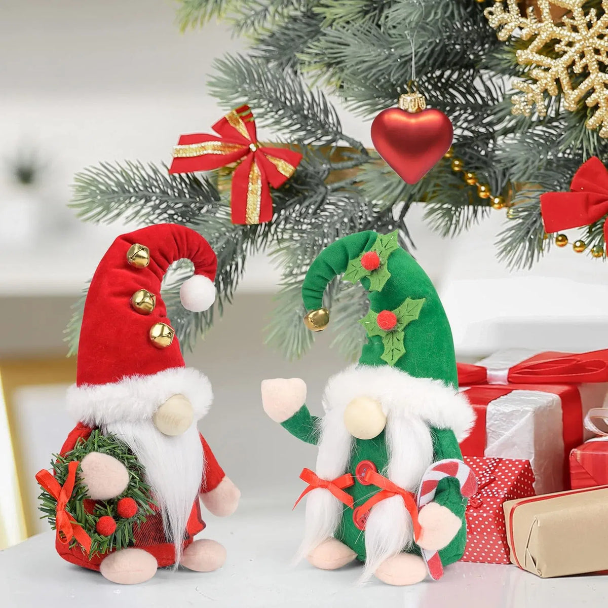 Pair of plush Christmas gnomes in red and green hats