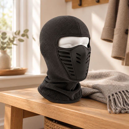 Thermal sports face mask on an oak entryway bench