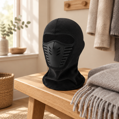 Thermal winter balaclava folded on an oak bench